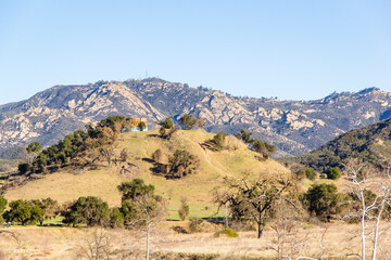 Views of the rolling hills, fall foliage, creek, and dry landscape at Malibu Creek State Park
