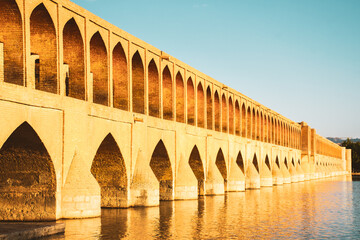 Isfahan, Iran - May 2022: SioSe Pol or Bridge of 33 arches, one of the oldest bridges of Esfahan and longest bridge on Zayandeh River