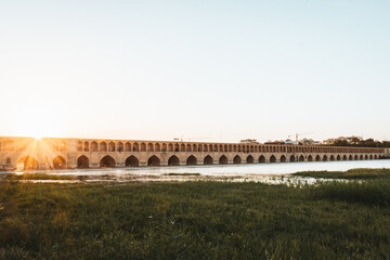 Isfahan, Iran - May 2022: SioSe Pol or Bridge of 33 arches, one of the oldest bridges of Esfahan and longest bridge on Zayandeh River