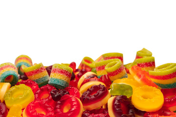 Assorted colorful gummy candies. Top view. Jelly donuts. Jelly bears. Isolated on a white background.