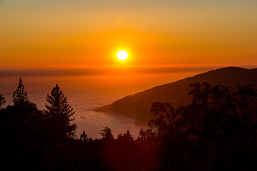 Sunset over the pacific at Big Sur. Camping on a mountain ridge.