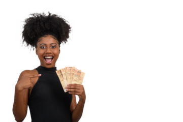 woman points to Brazilian money in her hand, positively surprised, space for text, person, advertising concept