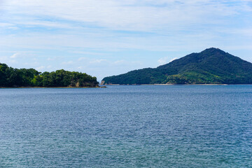 Summer mountains, sea and sky