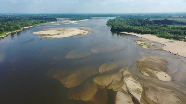 Aerial shot of  Vistula river with many sand islands showing the problem of river drying up. 
