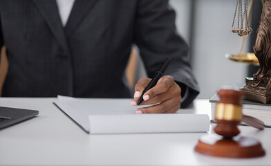African American Lawyer woman working at office desk, concepts of law and legal services, law contract.