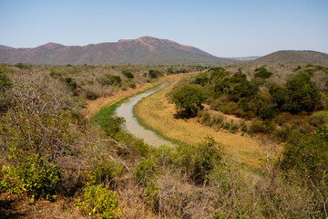 Landscape in the Big five Hluhluwe–Imfolozi Park, formerly Hluhluwe–Umfolozi Game Reserve in Kwa Zulu Natal in South Africa