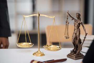 Law concept. Justice symbols on the table. Golden traditional balance scale on desk. Law.