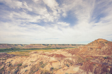 Landscape of a dramatic sky over the Badlands of Drumheller