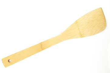 Wooden kitchen spatula isolated on white background