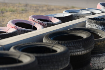 Close up shot of barrier tires in the race track