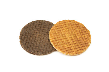 Two different round biscuits isolated on white background. Chocolate and regular golden stroopwafel dessert