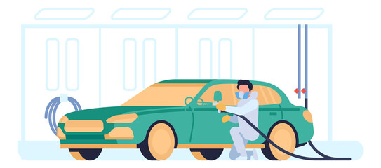 Man washing car at service. Worker in uniform cleaning vehicle