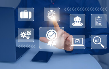 Pictograms of certificate, approval, compliance with requirements of international standards on background of laptop and hand of businessman. Quality of service, guarantees of company product standard