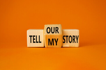 Tell our or my story symbol. Turned wooden cubes with words Tell my story and Tell our story....