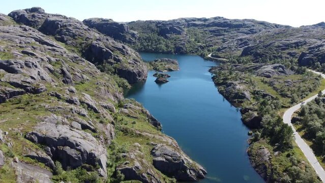 Aerial footage of remote mountain lake in Norway.