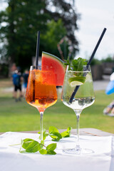 Summer refreshing cocktails on the background of the beach.