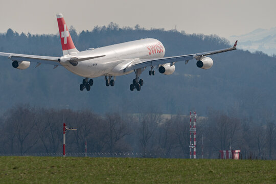 Swiss Airbus A340-313 jet final approach in Zurich in Switzerland 24.2.2022