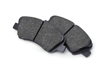 Brake pads isolated on white background, brake system maintenance on a passenger car