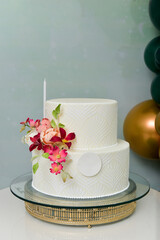 white party cake with flowers
