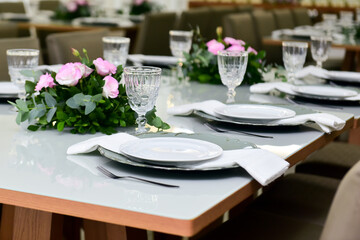 table set for a wedding reception, table setting, table setting in a restaurant, table setting for a dinner, restaurant interior