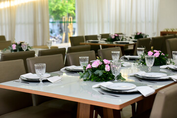 table set for a wedding reception, table setting, table setting in a restaurant, table setting for a dinner, restaurant interior