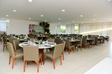room with chairs, table, room, table set for a birthday reception, table setting, table setting in a restaurant, table setting for a dinner, restaurant interior