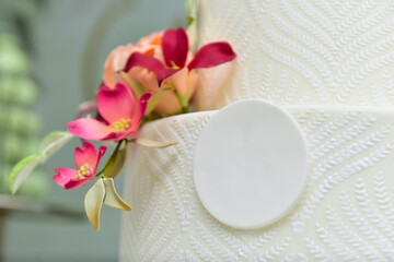 white party cake with flowers
