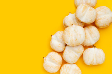 Toddy palm on yellow background.