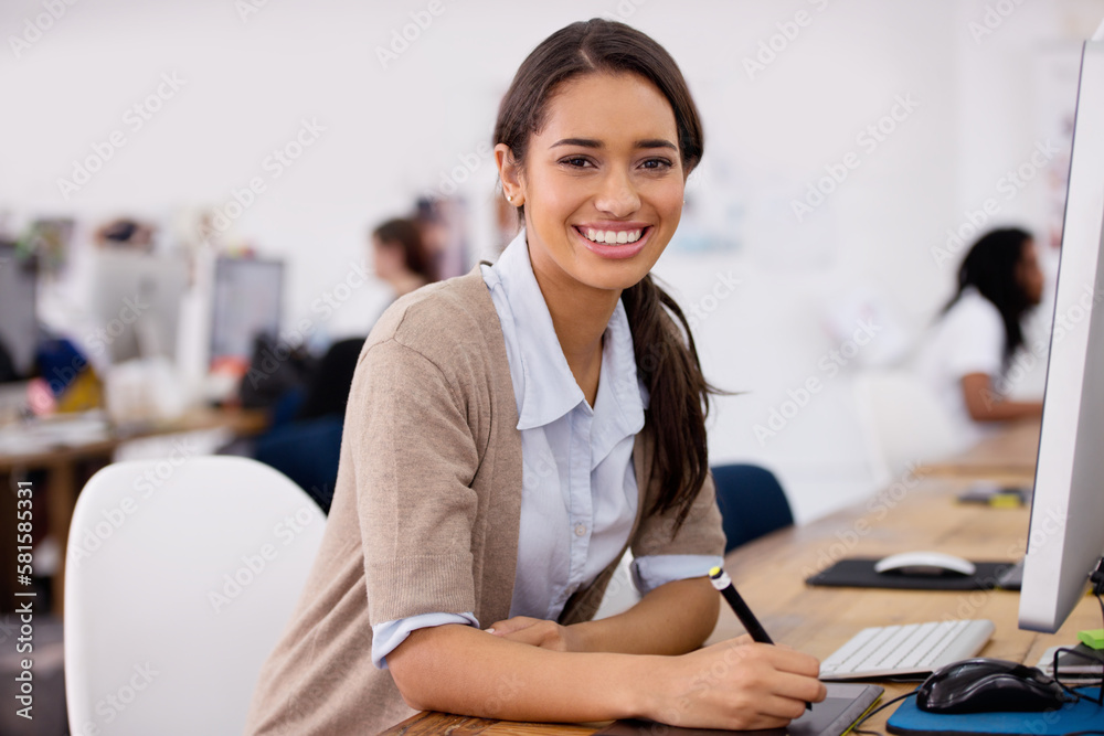 Poster She lives by the company brand. a beautiful young businesswoman sitting at her desk.