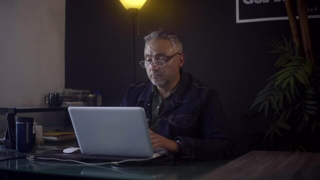 A entrepreneur man working from his home office