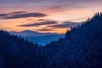 February evening in Pieniny - Sokolica. The setting sun on the background of the Tatra Mountains