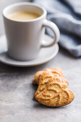 Tasty cookies and coffee cup. Sweet biscuits