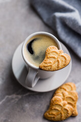 Tasty cookies and coffee cup. Sweet biscuits