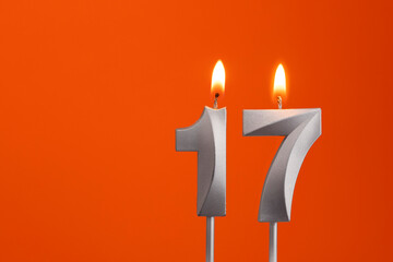 Candle number 17 - Birthday in orange background