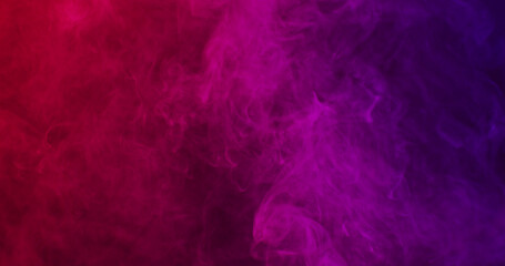 Close up of clouds of pink to purple smoke with copy space background