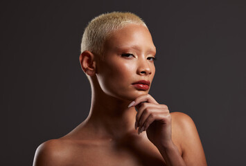 Beauty, makeup and skincare, portrait of black woman in dark studio with platinum hair isolated on grey background. Art aesthetic, cosmetics and beautiful African model in skin glow and luxury facial