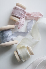 Pastel color of silk ribbon. Handmade. Fashion art material decoration on the table in wedding event.
