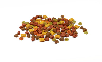 Pile of Dry Pet Food in a wooden spoon isolated on white background. Dog or cat food isolated.