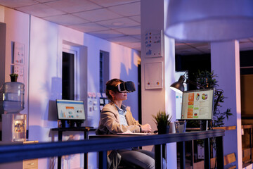 Businesswoman wearing virtual reality headset in startup office, analyzing financial growth report....