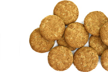 Round oatmeal cookies on white isolated background