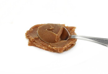 Smeared chestnut puree isolated. Marrons cream, marron spread, castanea jam, homemade chestnuts dessert puddle, stain, drops, spread or splatter on white background