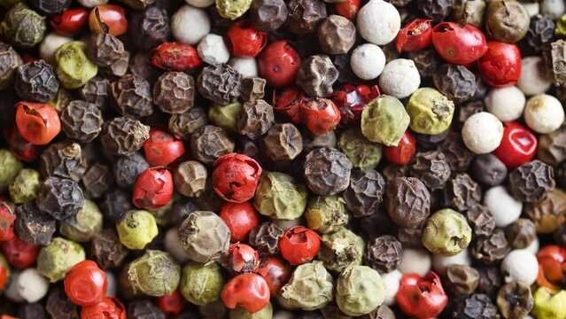 black red white green and allspice mix peppercorn background