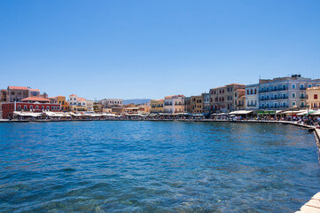 Chania harbor with coloured houses and restaurants  in Crete island, Greece