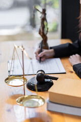 female business woman lawyers working at the law firms. Judge gavel with scales of justice. Legal...