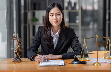 female business woman lawyers working at the law firms. Judge gavel with scales of justice. Legal...