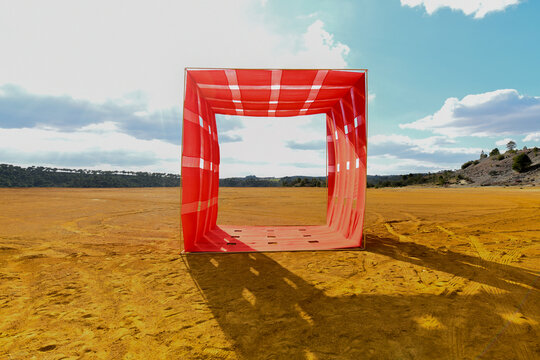red cube on landscape background with free space for product text