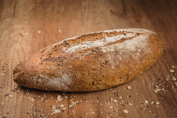 whole bread on wooden table