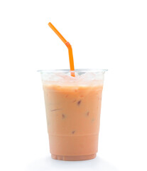 Orange Thai iced condensed milk tea in transparent plastic glass with straw is isolated on white background with clipping path and shadow in png file format