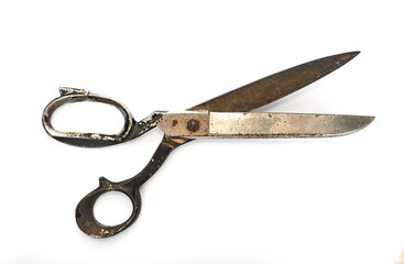 Open old tailor shears isolated on white background