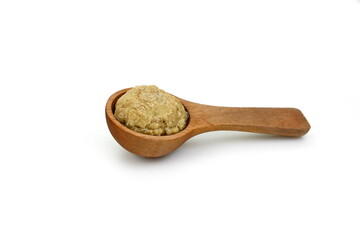 Eggplant dip in a wooden spoon  isolated on white background. Eggplant spread isolated.